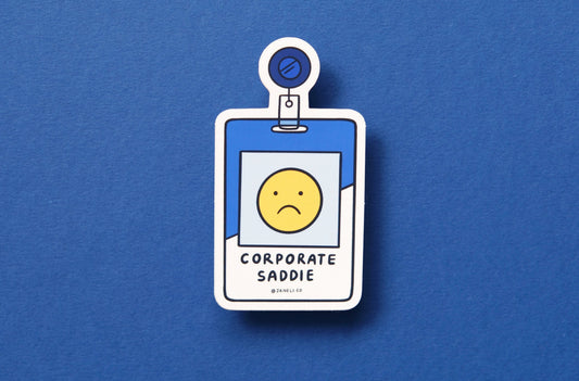 A JaneLi.Co sticker of a corporate badge that says "Corporate Saddie" over a blue background.