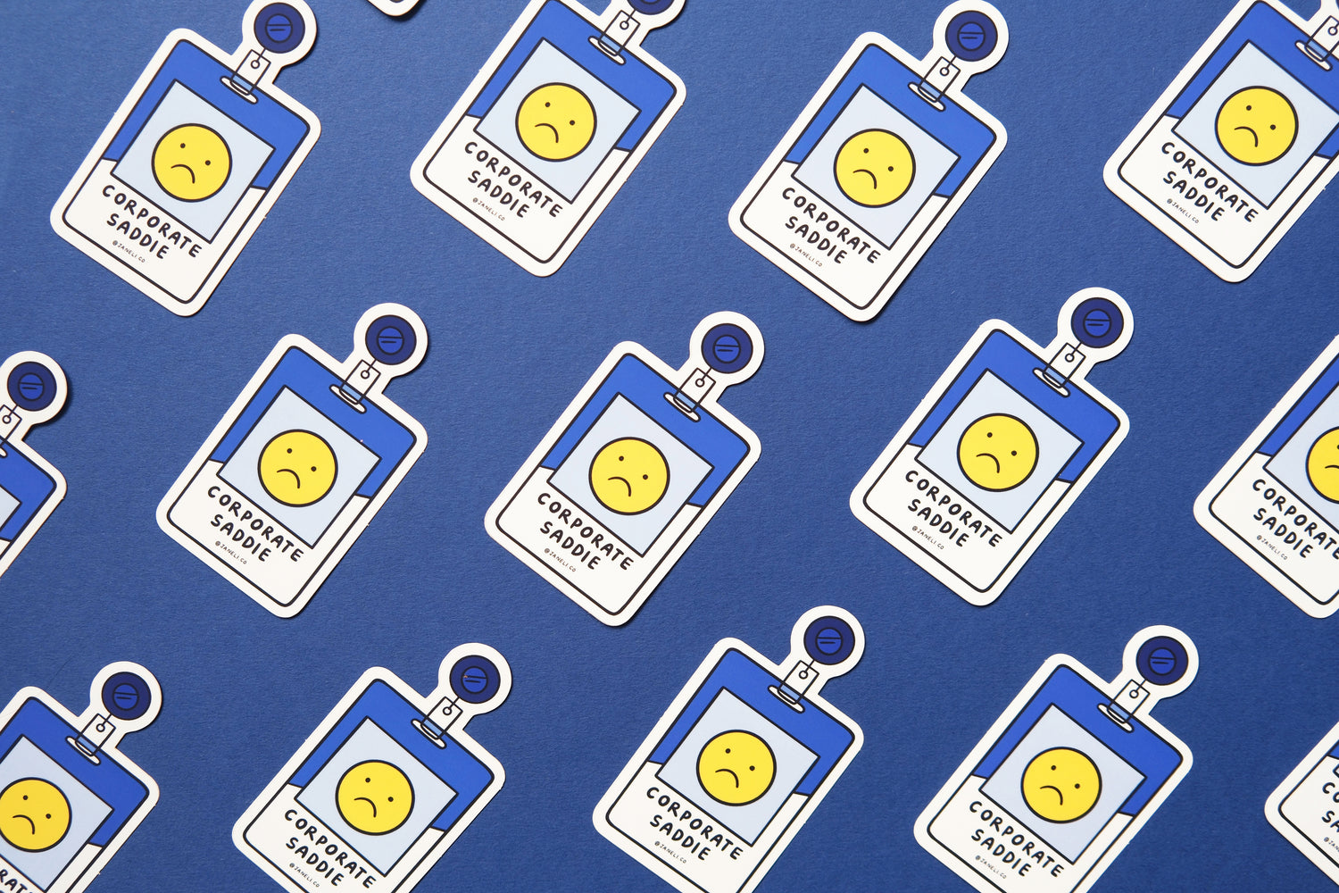 A grid of JaneLi.Co stickers of corporate badges that say "Corporate Saddie" over a blue background.