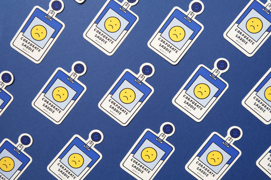 A grid of JaneLi.Co stickers of corporate badges that say "Corporate Saddie" over a blue background.