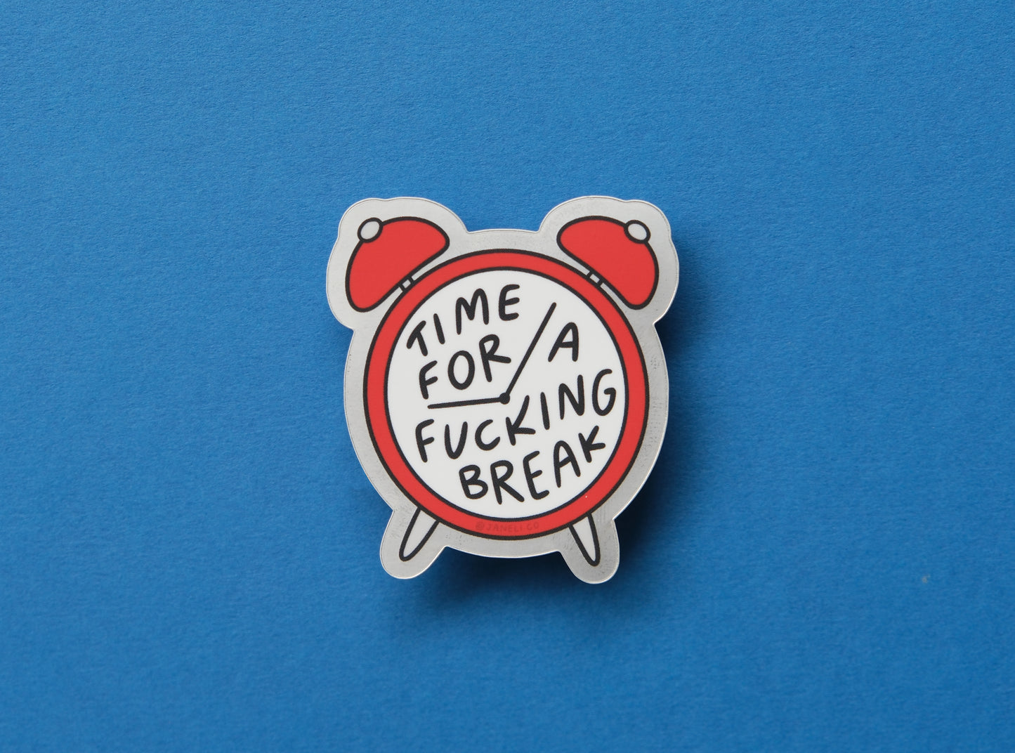 A JaneLi.Co sticker of an alarm clock that says "Time for a Fucking Break" on the face over a blue background.