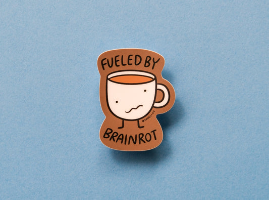 A JaneLi.Co sticker of a wonky coffee mug that says "Fueled by brainrot" over a blue background.