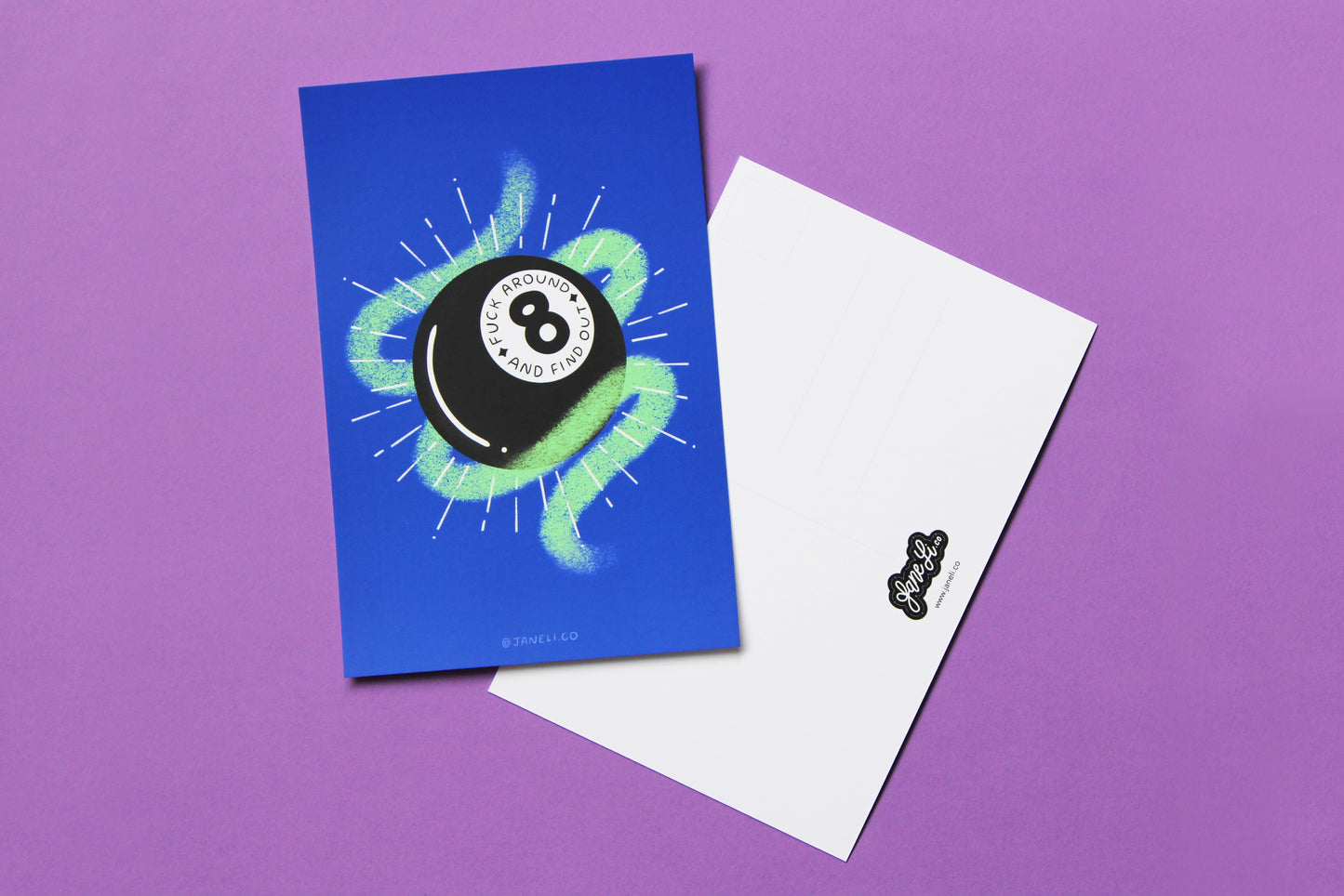 A JaneLi.Co mini print/postcard that says "Fuck Around and Find Out" on a magic 8 ball and a back postcard side of the same print over a purple background.