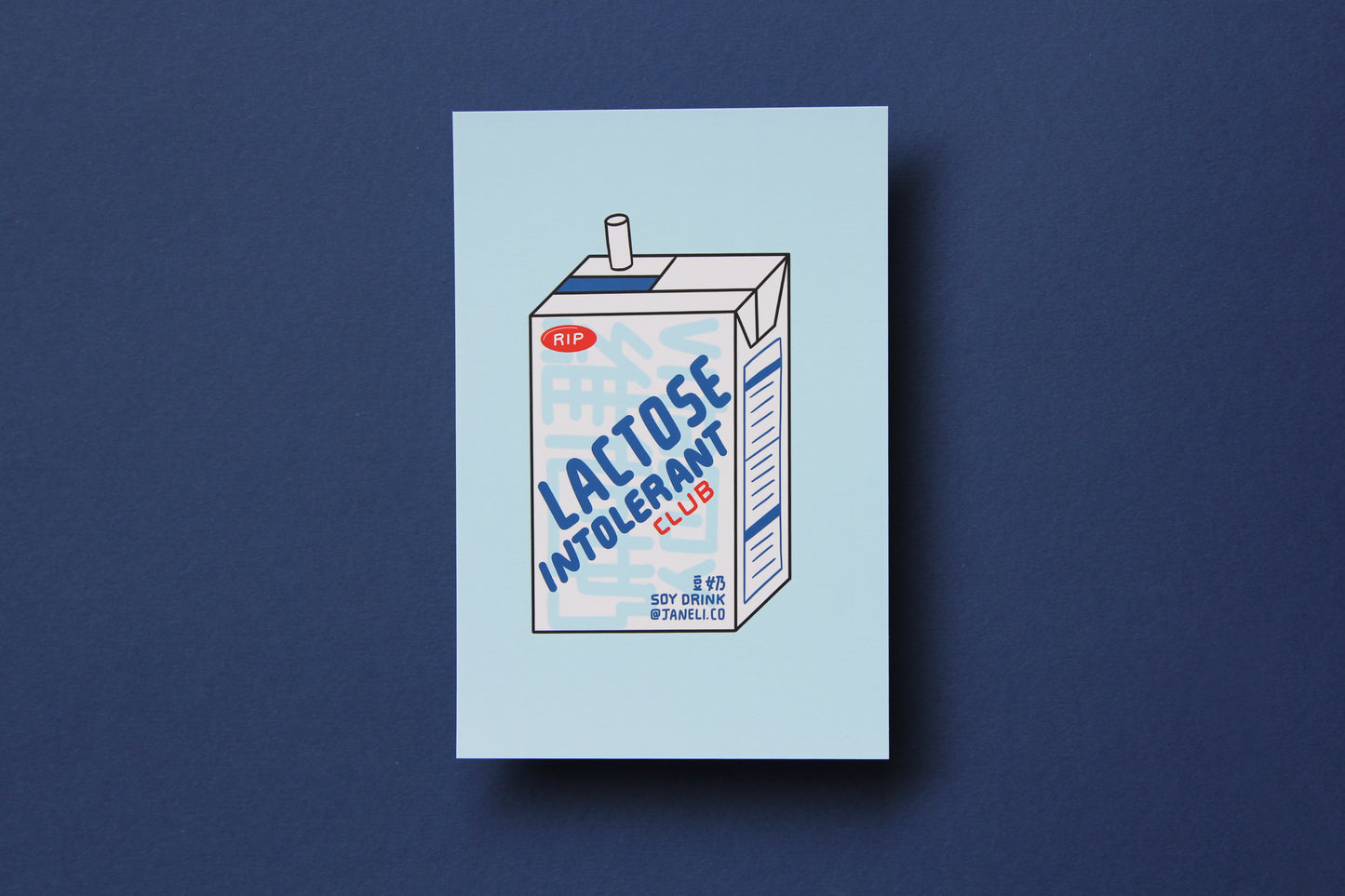 A JaneLi.Co mini print/postcard of a soymilk carton that says "Lactose Intolerant Club" over a navy blue background.