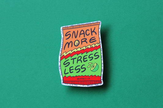 A JaneLi.Co sticker of a lime hot cheeto chip bag that says "Snack more stress less" over a green background.