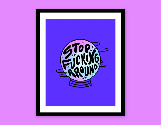 A digital mock of a framed JaneLi.Co print that says "Stop Fucking Around" in the shape of a magic crystal ball over a purple background.
