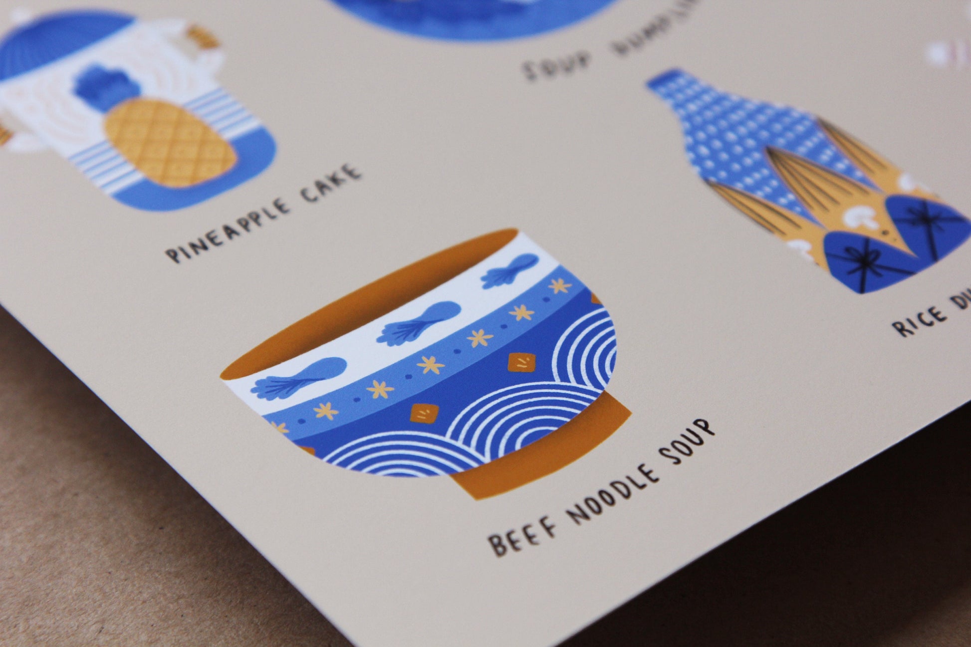 A close up of a JaneLi.Co print that says "Taiwanese Foods As Ceramics" with 9 different illustrations of ceramics over a brown background.