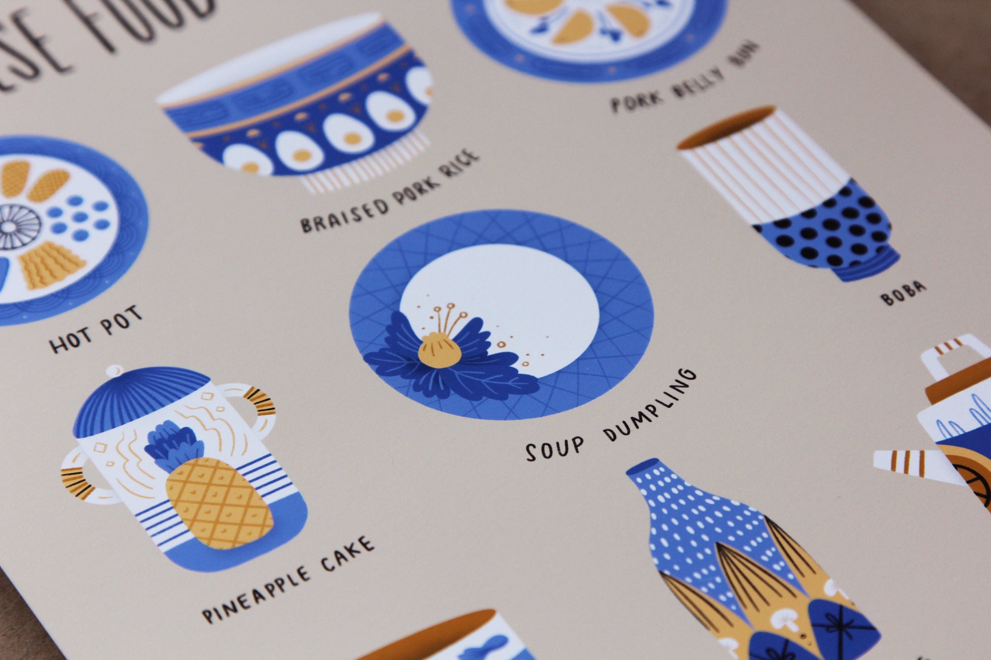 A close up of a JaneLi.Co print that says "Taiwanese Foods As Ceramics" with 9 different illustrations of ceramics over a brown background.