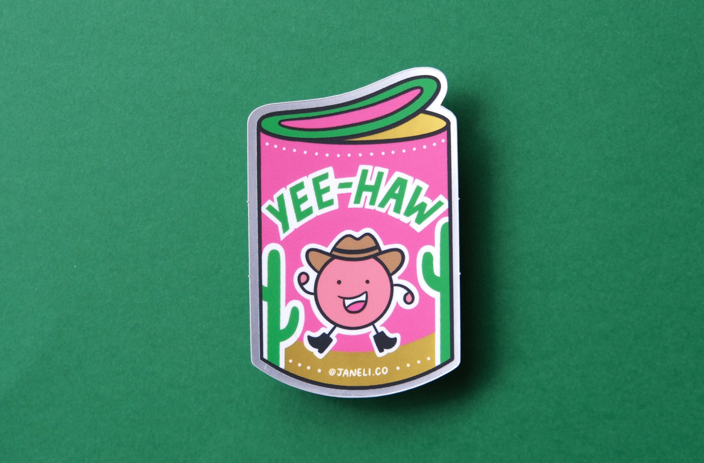 A JaneLi.Co sticker of a haw flake with a cowboy character that says "Yee-Haw" over a green background.