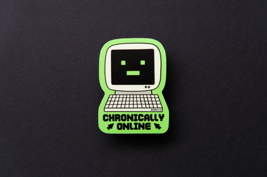 A JaneLi.Co sticker of a retro computer with a -_- face that says "Chronically Online" over a black background.