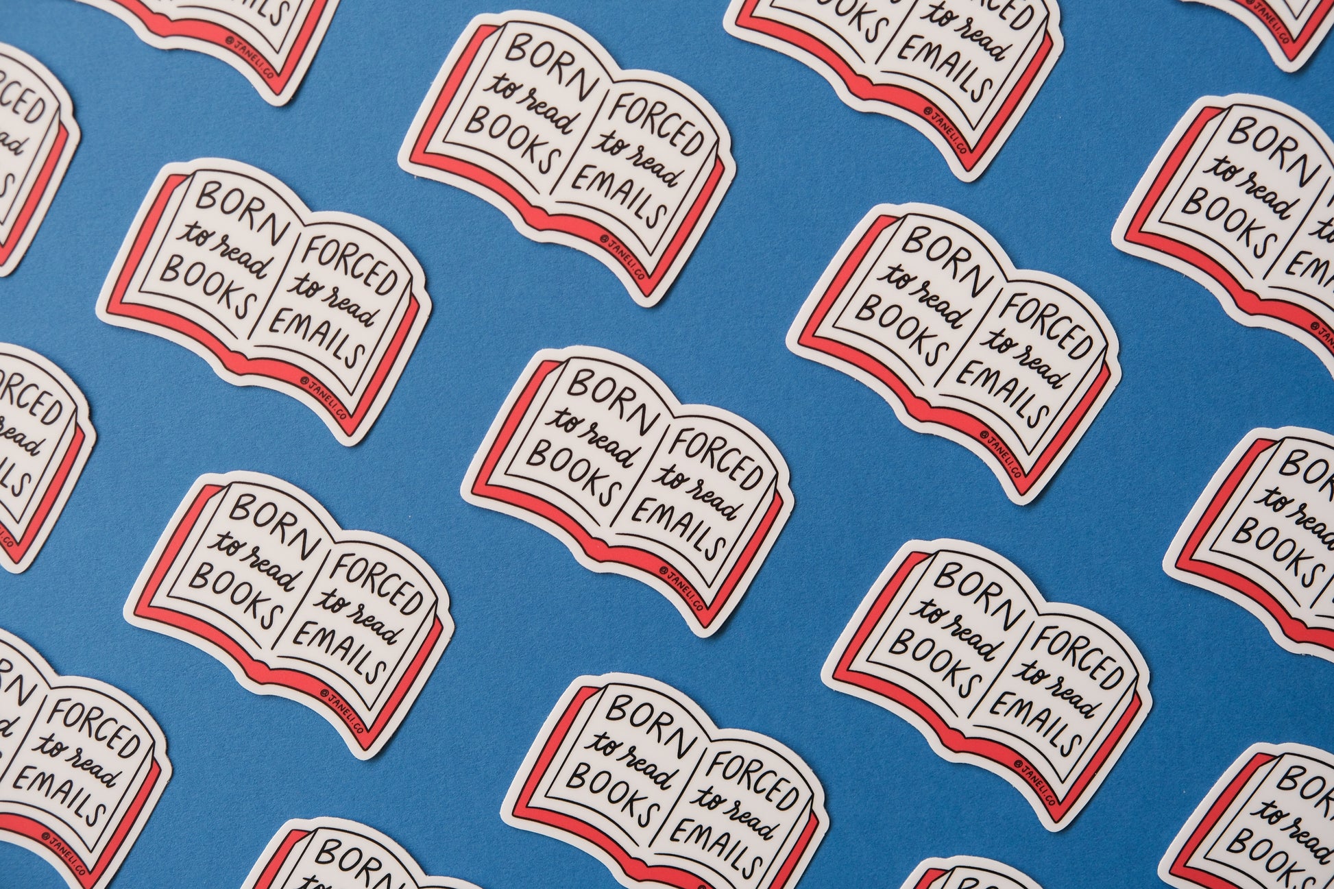 A grid of JaneLi.Co stickers of open books that say "Born to read books, forced to read emails" over a blue background.