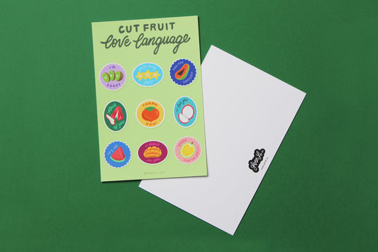 A JaneLi.Co mini print/postcard that says "Cut Fruit Love Language" with 9 different fruit stickers with different messages and a back postcard side of the same print over a green background.