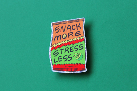 A JaneLi.Co sticker of a lime hot cheeto chip bag that says "Snack more stress less" over a green background.