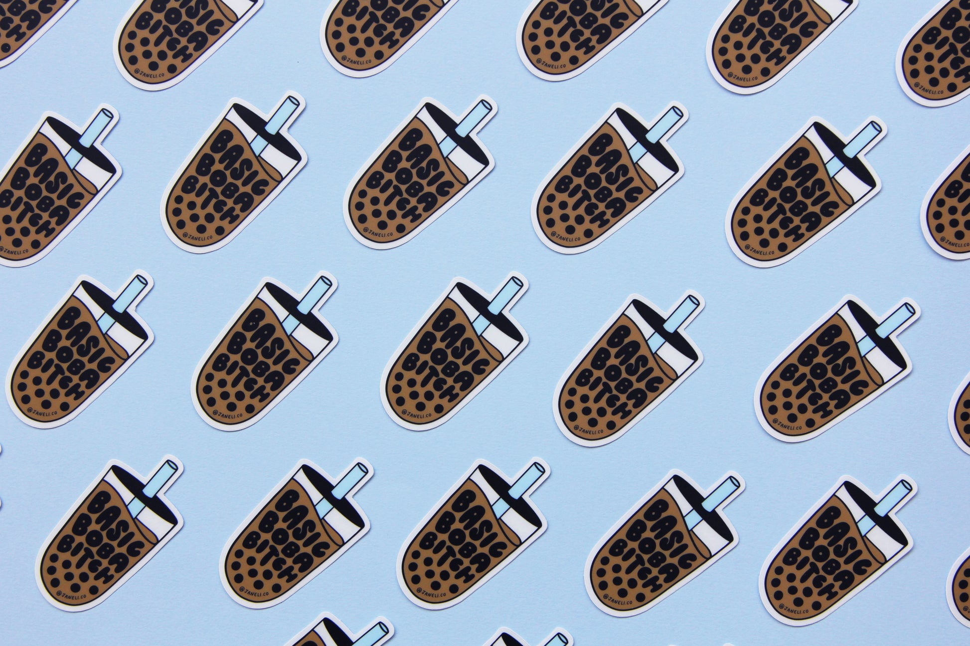 A grid of JaneLi.Co stickers that say "Basic Boba Bitch" in the shape of cups of boba over a sky blue background. 