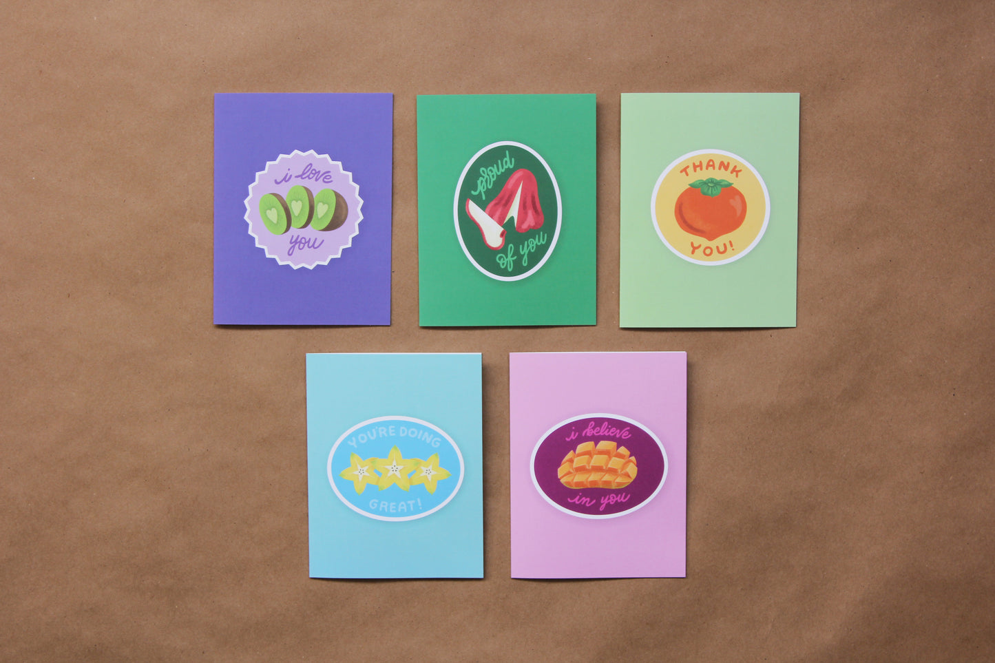 A photo of a grid of 5 Cut Fruit Love Language Cards laid out in 2 rows.